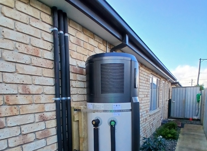 Heat pump water heater installed outside